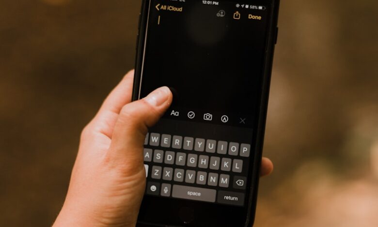 person holding black android smartphone