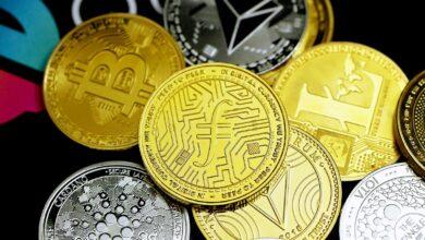 a pile of bitcoins sitting on top of each other