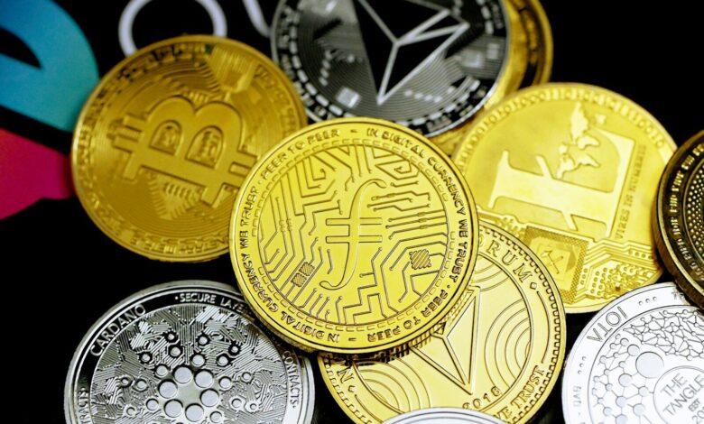 a pile of bitcoins sitting on top of each other