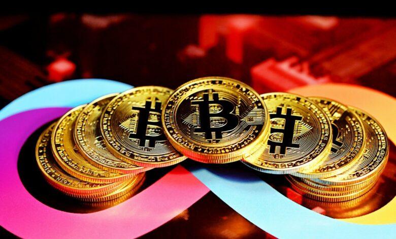 a pile of bitcoins sitting on top of each other